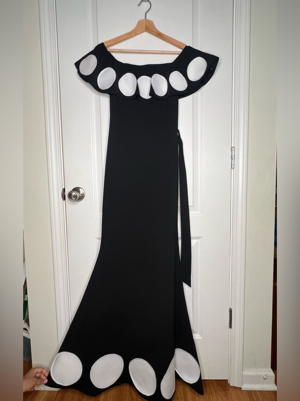 Black Off-Shoulder Gown with White Circular Trim